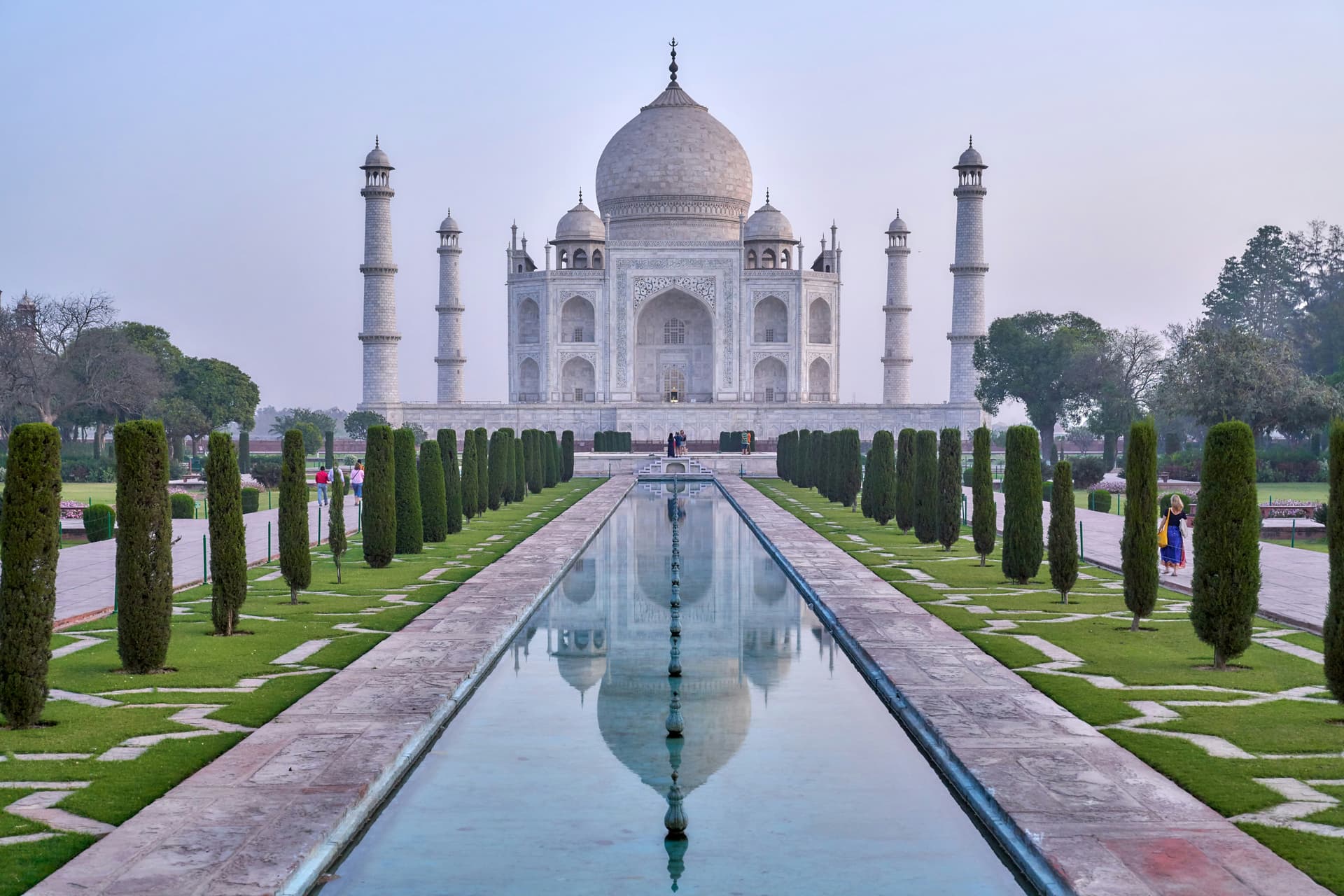 The Taj Mahal reflected in its long pool in Agra, India